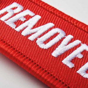 “Remove Before Flight”: Dé sleutelhanger met logo