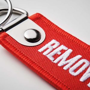 Remove Before Flight keychain with logo &ndash; Embroidered, premium and cheaper nowhere
